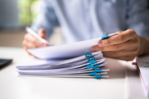 person doing paperwork